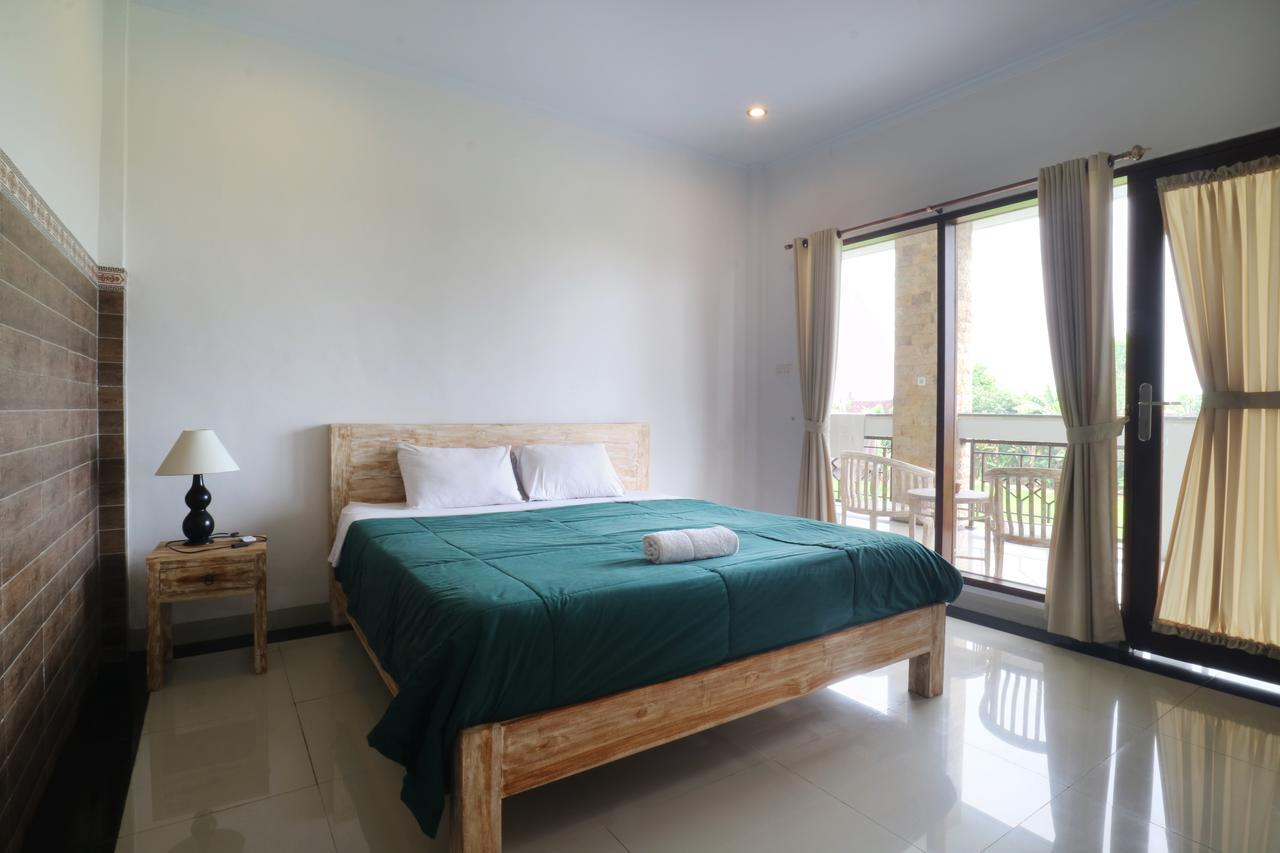 Agung Homestay Canggu Mitra Reddoorz Exterior foto